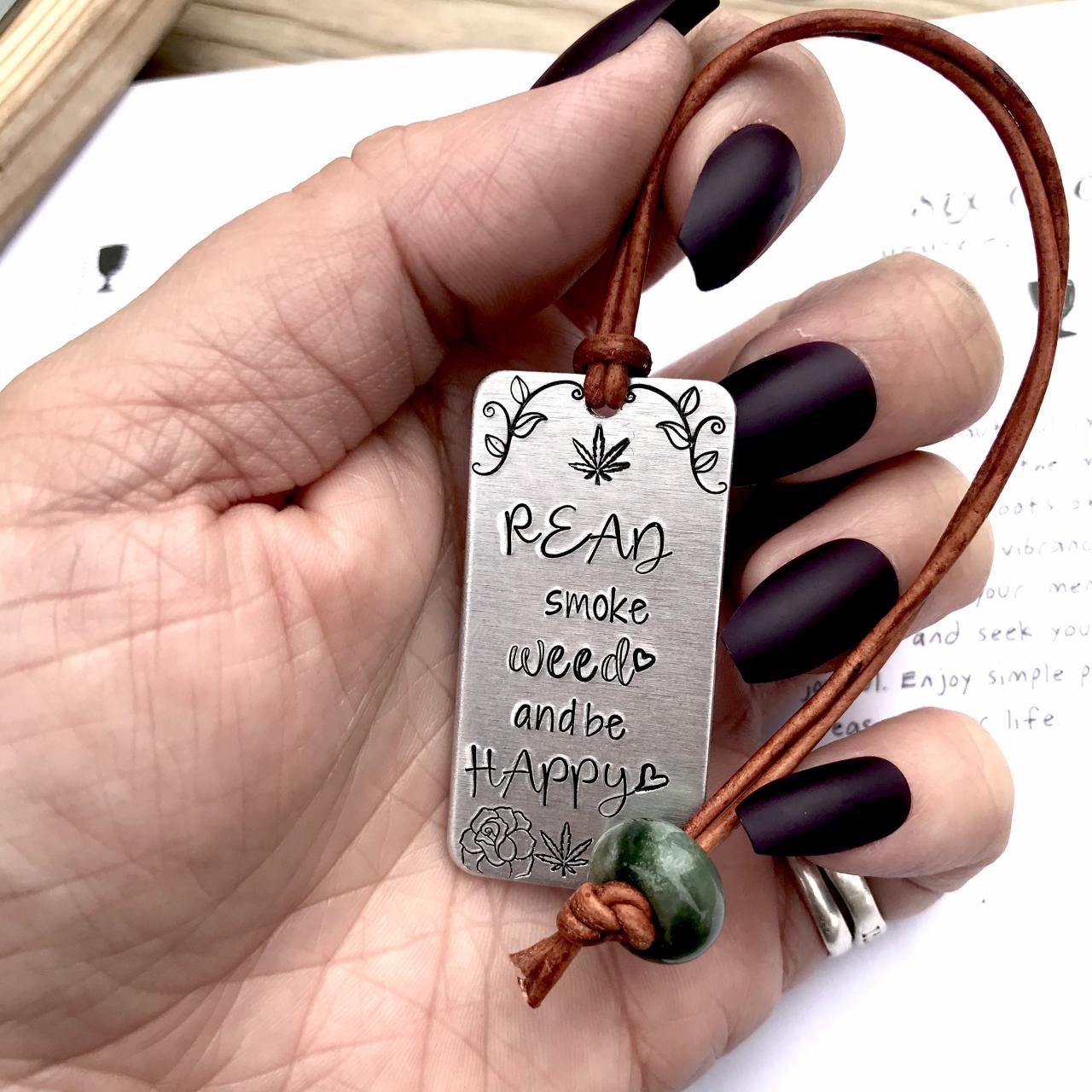 Marijuana leaf, hand stamped metal, Read, smoke weed and be happy metal bookmark with leather cord and stone bead